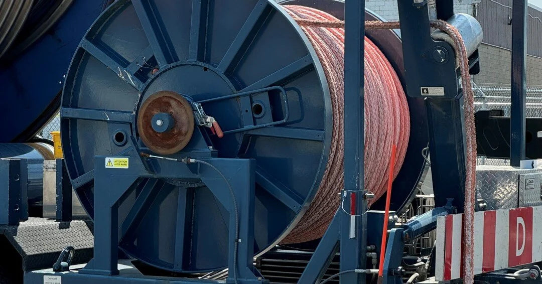 Blue winch drum loaded with Barry industrial rope